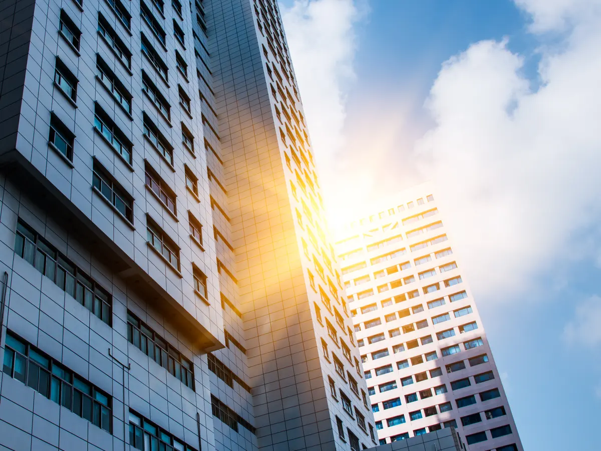 Modern commercial office tower with glass facade